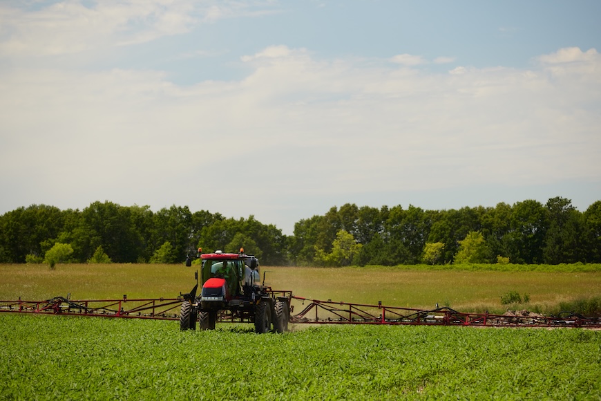 Red sprayer applying a fungicide application 